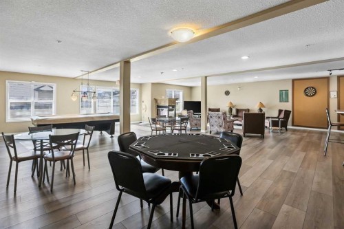 2117-303 Arbour Crest Drive Nw, Calgary, AB - Indoor Photo Showing Dining Room