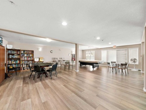 2117-303 Arbour Crest Drive Nw, Calgary, AB - Indoor Photo Showing Dining Room