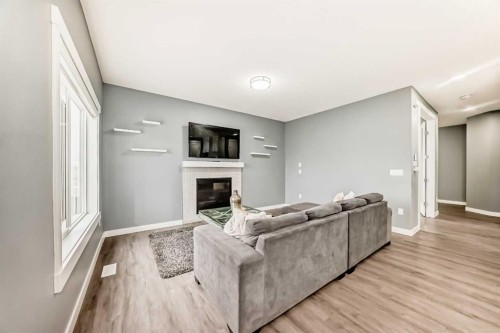 753 Edgefield Crescent, Strathmore, AB - Indoor Photo Showing Living Room With Fireplace
