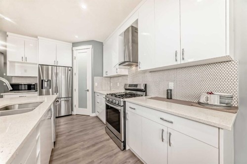 753 Edgefield Crescent, Strathmore, AB - Indoor Photo Showing Kitchen With Stainless Steel Kitchen With Double Sink With Upgraded Kitchen