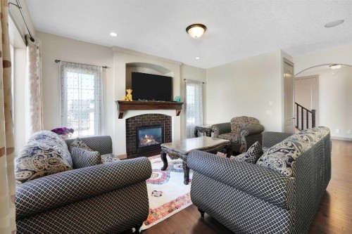 282 Pantego Terrace Nw, Calgary, AB - Indoor Photo Showing Living Room With Fireplace