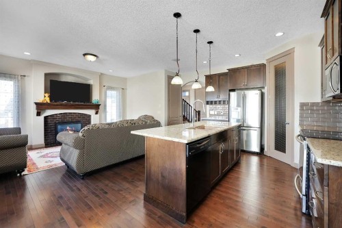 282 Pantego Terrace Nw, Calgary, AB - Indoor Photo Showing Other Room With Fireplace