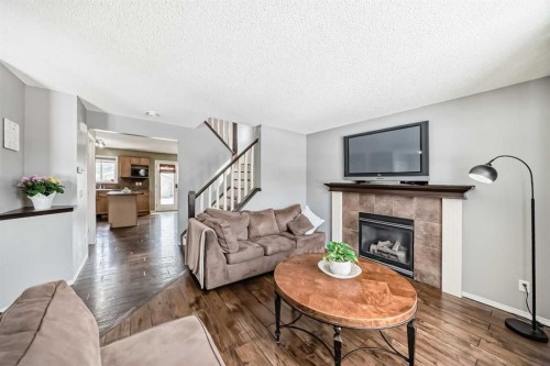 71 Covepark Rise Ne, Calgary, AB - Indoor Photo Showing Living Room With Fireplace