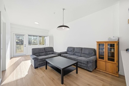 2216-151 Skyview Bay Ne, Calgary, AB - Indoor Photo Showing Living Room