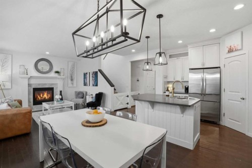 119 Prestwick Terrace Se, Calgary, AB - Indoor With Fireplace