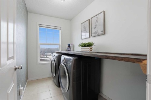119 Prestwick Terrace Se, Calgary, AB - Indoor Photo Showing Laundry Room