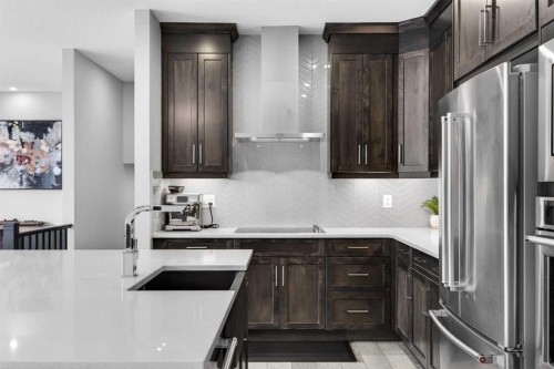 73 Yorkstone Heath Sw, Calgary, AB - Indoor Photo Showing Kitchen With Upgraded Kitchen