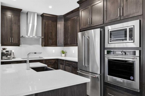73 Yorkstone Heath Sw, Calgary, AB - Indoor Photo Showing Kitchen With Upgraded Kitchen