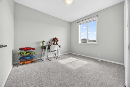 73 Yorkstone Heath Sw, Calgary, AB - Indoor Photo Showing Other Room