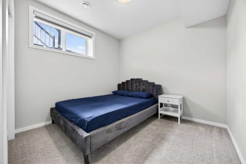 73 Yorkstone Heath Sw, Calgary, AB - Indoor Photo Showing Bedroom