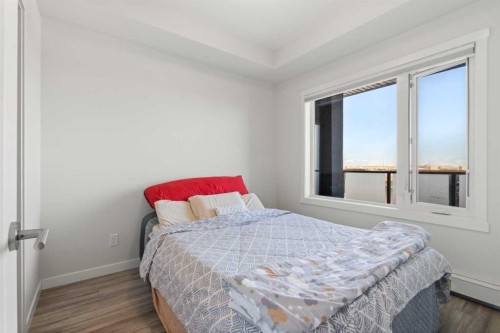208-138 Sage Valley Common Nw, Calgary, AB - Indoor Photo Showing Bedroom