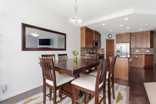 512 Panatella Square Nw, Calgary, AB - Indoor Photo Showing Dining Room