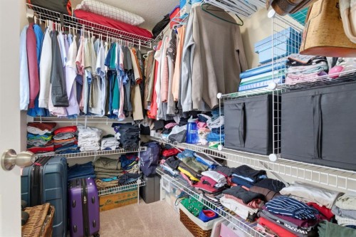 512 Panatella Square Nw, Calgary, AB - Indoor With Storage