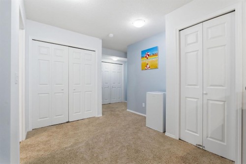 512 Panatella Square Nw, Calgary, AB - Indoor Photo Showing Other Room