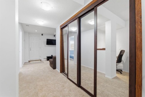 512 Panatella Square Nw, Calgary, AB - Indoor Photo Showing Other Room