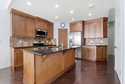 512 Panatella Square Nw, Calgary, AB - Indoor Photo Showing Kitchen With Stainless Steel Kitchen