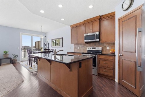 512 Panatella Square Nw, Calgary, AB - Indoor Photo Showing Kitchen With Stainless Steel Kitchen With Upgraded Kitchen