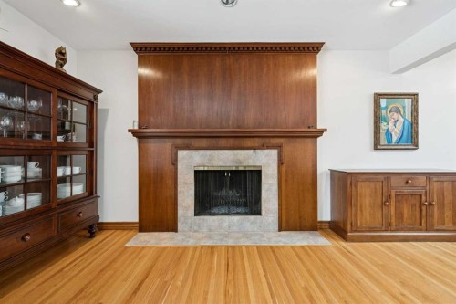 4104 Crestview Road Sw, Calgary, AB - Indoor Photo Showing Living Room With Fireplace