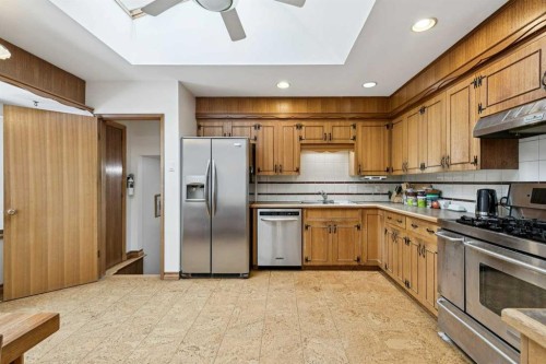 4104 Crestview Road Sw, Calgary, AB - Indoor Photo Showing Kitchen With Stainless Steel Kitchen