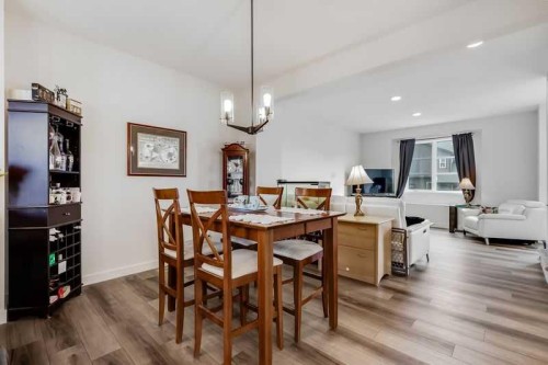 100 Langwell Common Se, Airdrie, AB - Indoor Photo Showing Dining Room