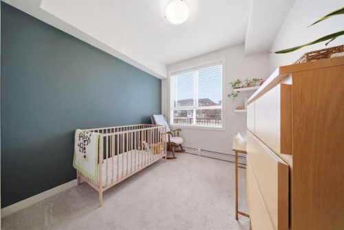 104-20 Walgrove Walk Se, Calgary, AB - Indoor Photo Showing Bedroom