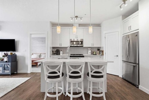104-20 Walgrove Walk Se, Calgary, AB - Indoor Photo Showing Kitchen With Double Sink