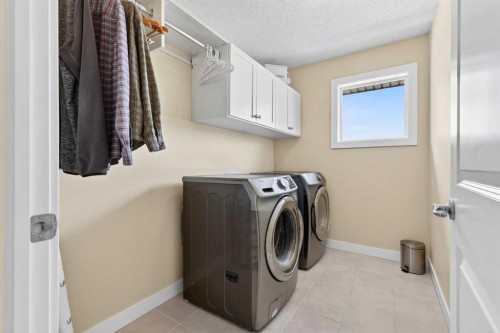 204 Walden Landing Se, Calgary, AB - Indoor Photo Showing Laundry Room