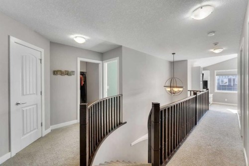 140 Rainbow Falls Heath, Chestermere, AB - Indoor Photo Showing Other Room