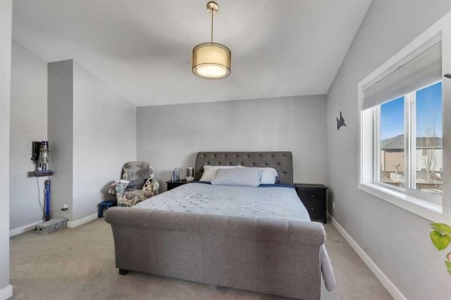 140 Rainbow Falls Heath, Chestermere, AB - Indoor Photo Showing Bedroom