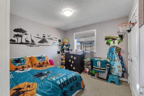 140 Rainbow Falls Heath, Chestermere, AB - Indoor Photo Showing Bedroom
