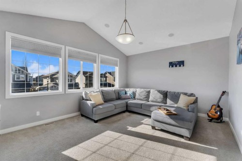 140 Rainbow Falls Heath, Chestermere, AB - Indoor Photo Showing Living Room
