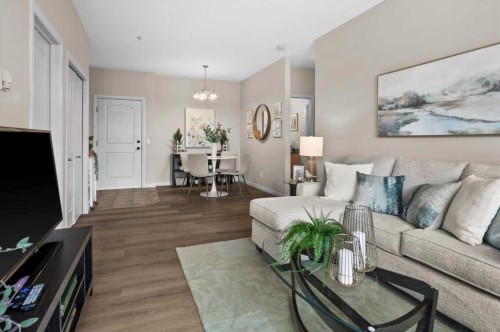 219-8 Prestwick Pond Terrace Se, Calgary, AB - Indoor Photo Showing Living Room