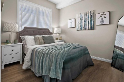 219-8 Prestwick Pond Terrace Se, Calgary, AB - Indoor Photo Showing Bedroom