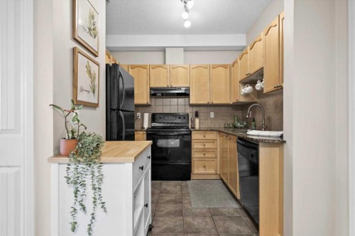 219-8 Prestwick Pond Terrace Se, Calgary, AB - Indoor Photo Showing Kitchen