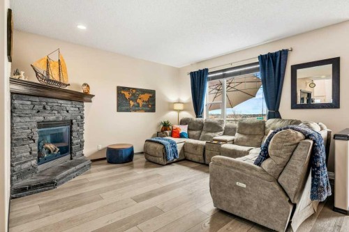 201 Pantego Road Nw, Calgary, AB - Indoor Photo Showing Living Room With Fireplace