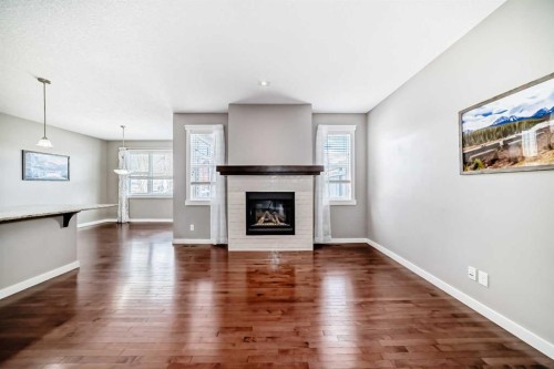 112 Chaparral Valley View Se, Calgary, AB - Indoor Photo Showing Living Room With Fireplace