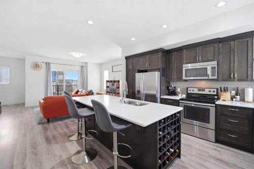 301 Nolanlake Villas Nw, Calgary, AB - Indoor Photo Showing Kitchen With Stainless Steel Kitchen With Double Sink