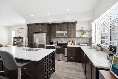 301 Nolanlake Villas Nw, Calgary, AB - Indoor Photo Showing Kitchen With Stainless Steel Kitchen With Double Sink With Upgraded Kitchen