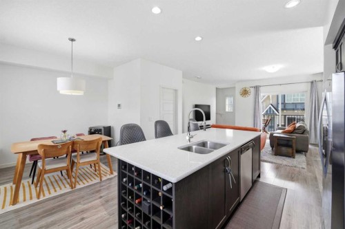 301 Nolanlake Villas Nw, Calgary, AB - Indoor Photo Showing Kitchen With Double Sink