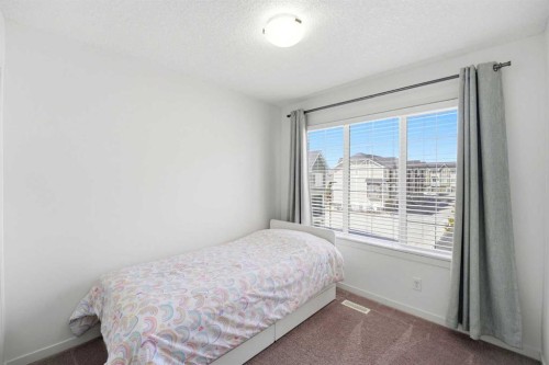 301 Nolanlake Villas Nw, Calgary, AB - Indoor Photo Showing Bedroom