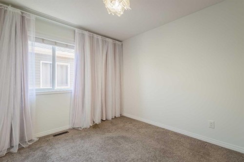 271 Windford Crescent Sw, Airdrie, AB - Indoor Photo Showing Other Room