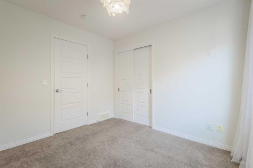 271 Windford Crescent Sw, Airdrie, AB - Indoor Photo Showing Other Room