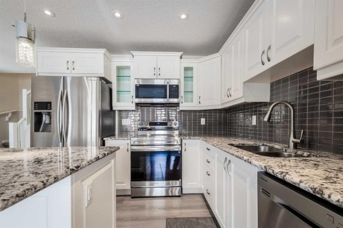 271 Windford Crescent Sw, Airdrie, AB - Indoor Photo Showing Kitchen With Stainless Steel Kitchen With Double Sink With Upgraded Kitchen