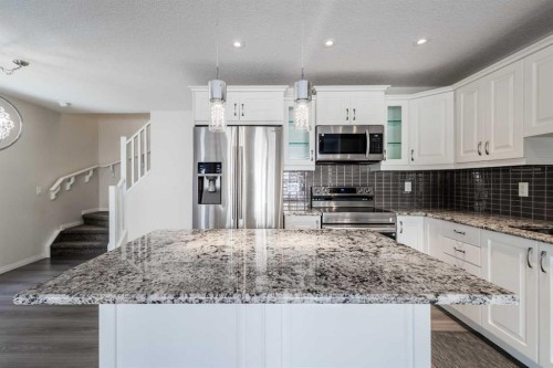 271 Windford Crescent Sw, Airdrie, AB - Indoor Photo Showing Kitchen With Stainless Steel Kitchen With Upgraded Kitchen