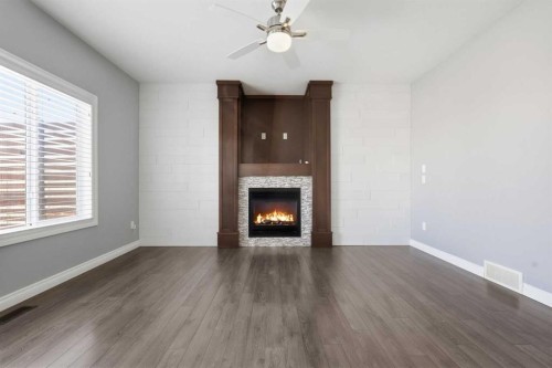 196 Evansborough Way Nw, Calgary, AB - Indoor Photo Showing Living Room With Fireplace