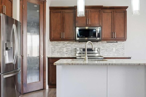 196 Evansborough Way Nw, Calgary, AB - Indoor Photo Showing Kitchen With Upgraded Kitchen