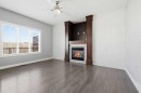 196 Evansborough Way Nw, Calgary, AB  - Indoor Photo Showing Living Room With Fireplace 