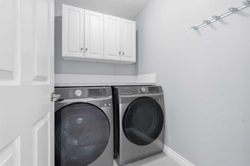 196 Evansborough Way Nw, Calgary, AB - Indoor Photo Showing Laundry Room