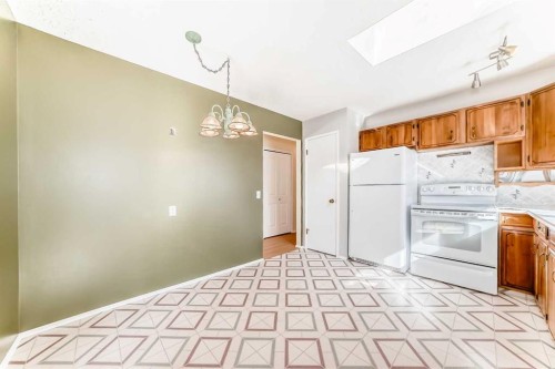 60 Huntham Road Ne, Calgary, AB - Indoor Photo Showing Kitchen