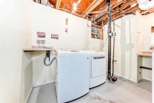60 Huntham Road Ne, Calgary, AB - Indoor Photo Showing Laundry Room